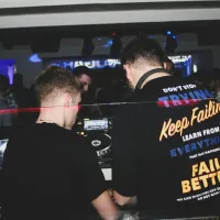 man in black and yellow crew neck t-shirt